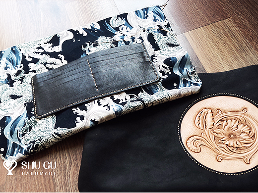 皮雕镶嵌手拿包