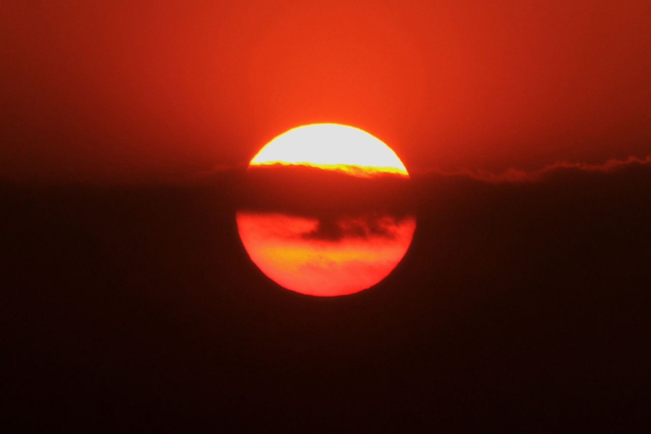 曾有人问我:“为什么你那么喜欢日落”