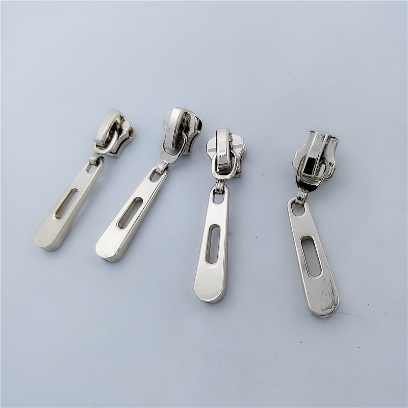 拉头定制服装金属辅料拉链片金属牌子母扣铭牌吊坠生产