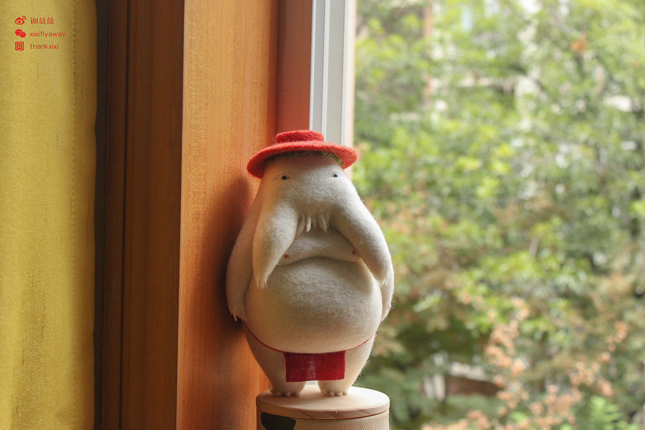 囍囍的羊毛毡之千寻里的萝卜精