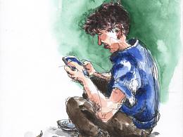 路边玩手机的表弟