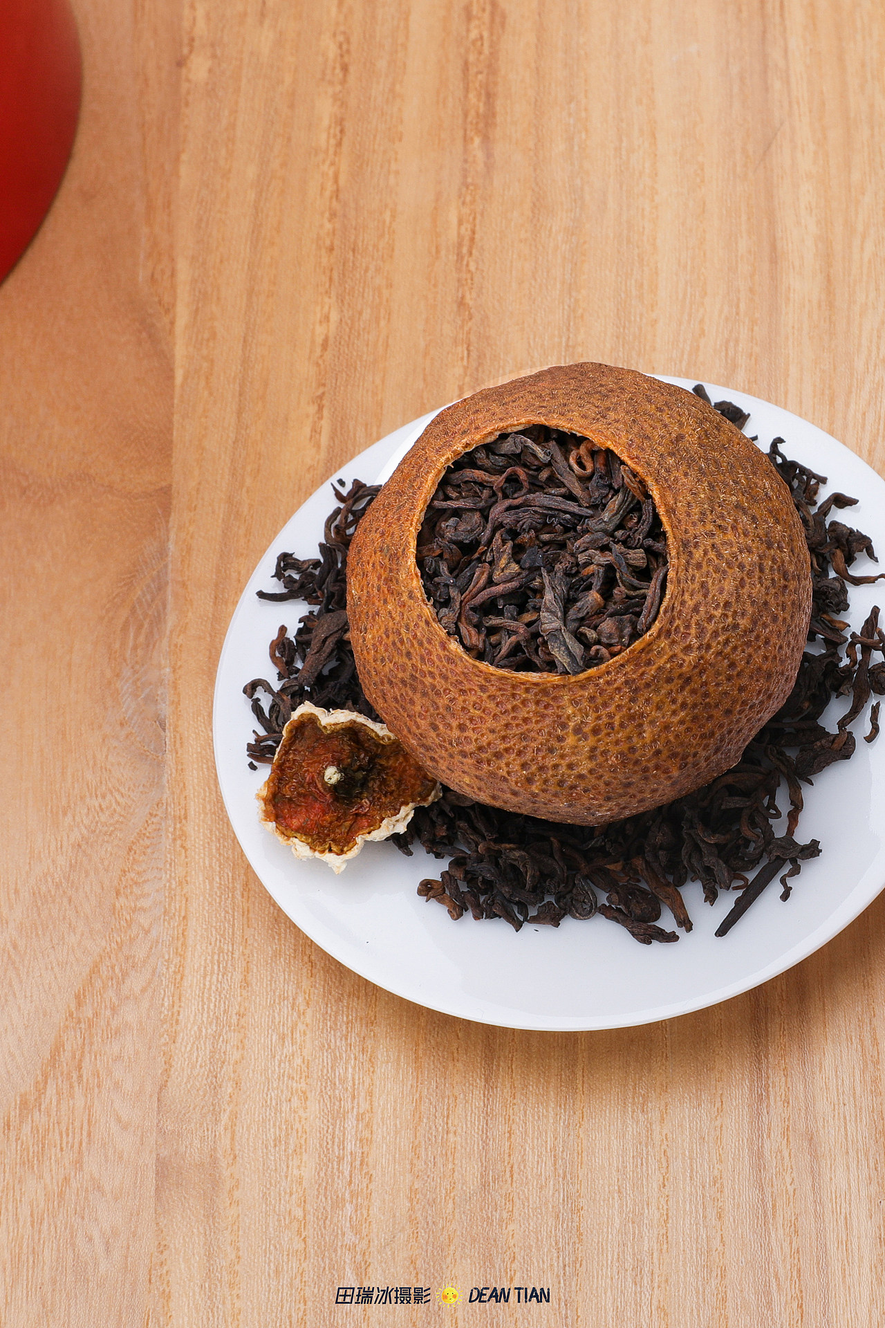 田石页摄影dean大益大红柑普洱茶