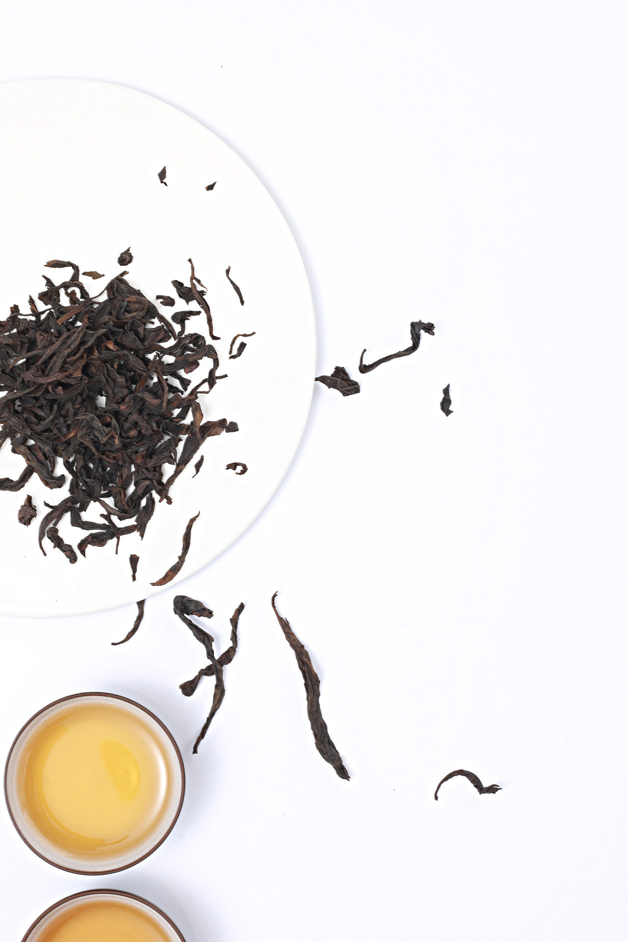 茶叶茶具-正山小种大红袍茶叶-紫砂壶-茶盘白背景拍摄