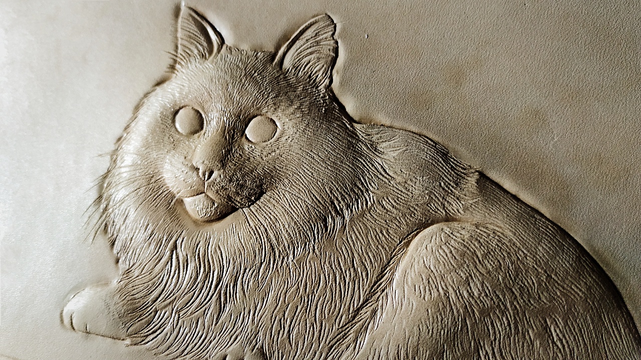 猫的皮雕画
