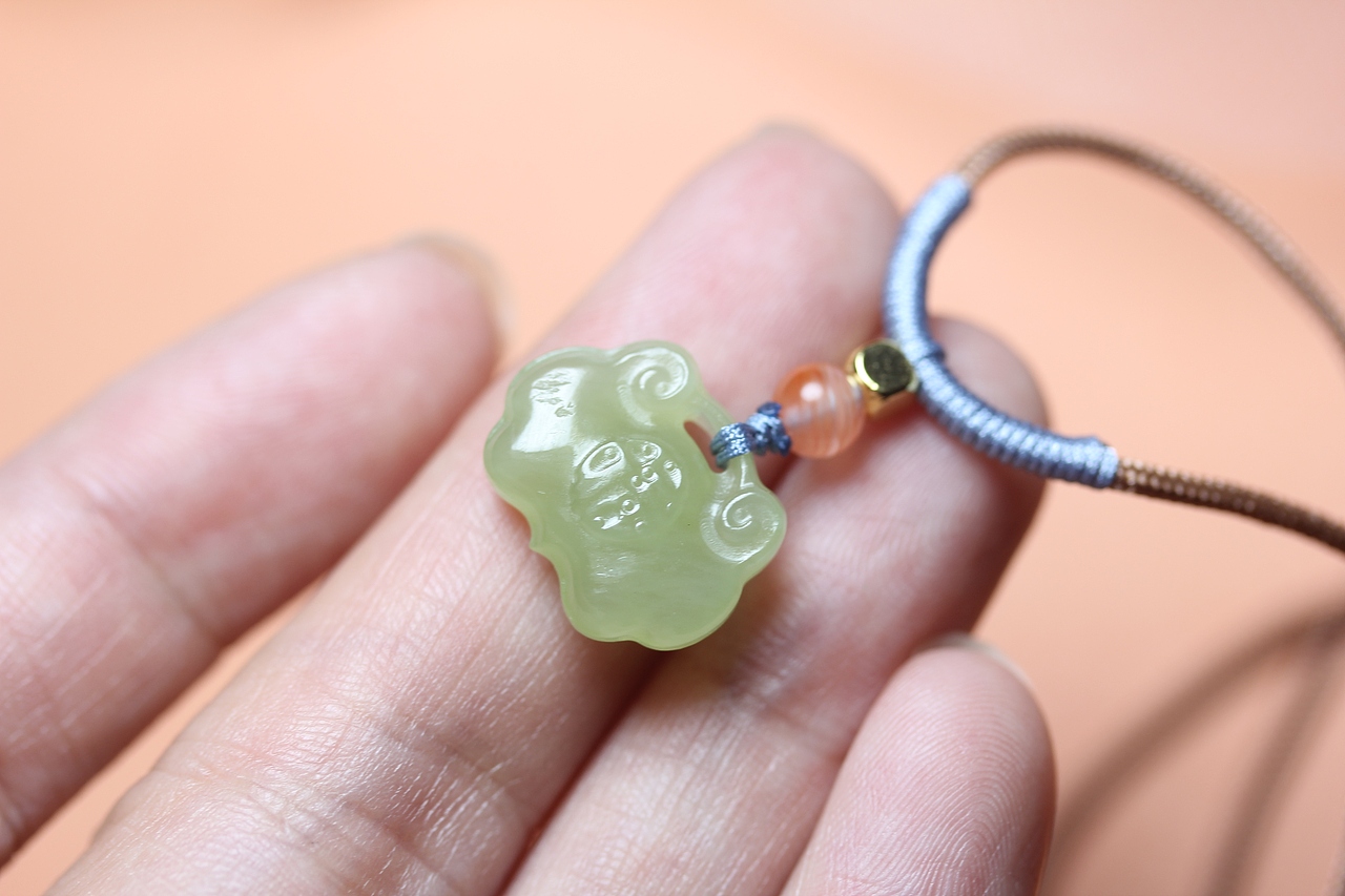 九张23.6.15马料黑色巧雕年年有余