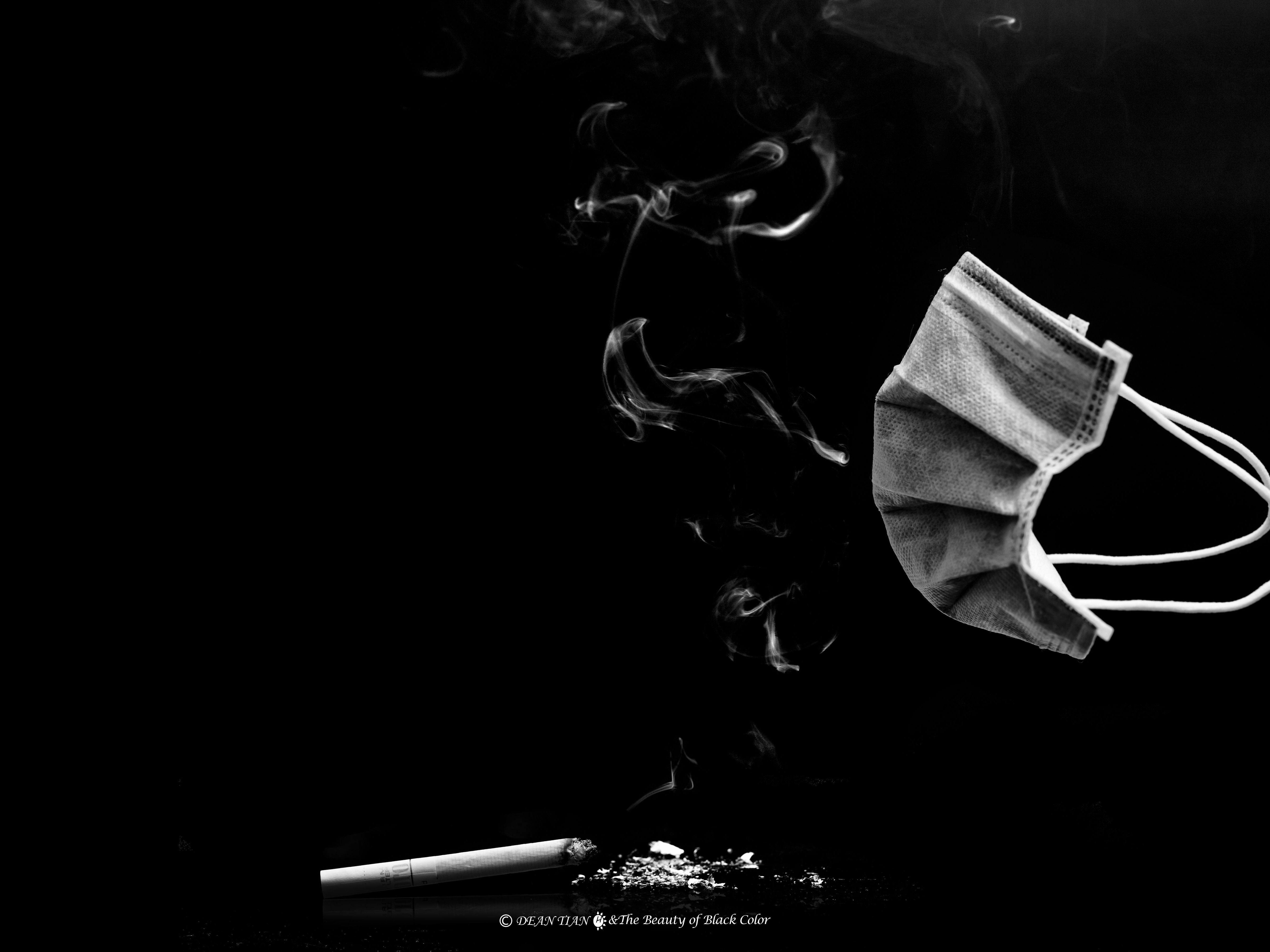 Smoking woman in glasses, dark portrait free image download