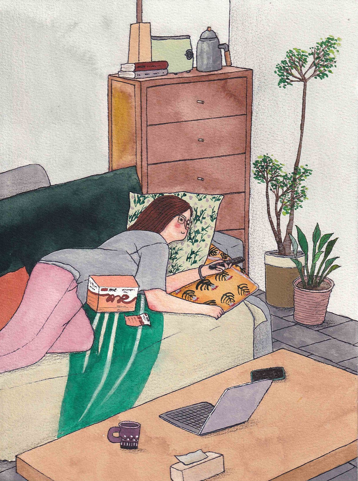 窝在沙发里看电视