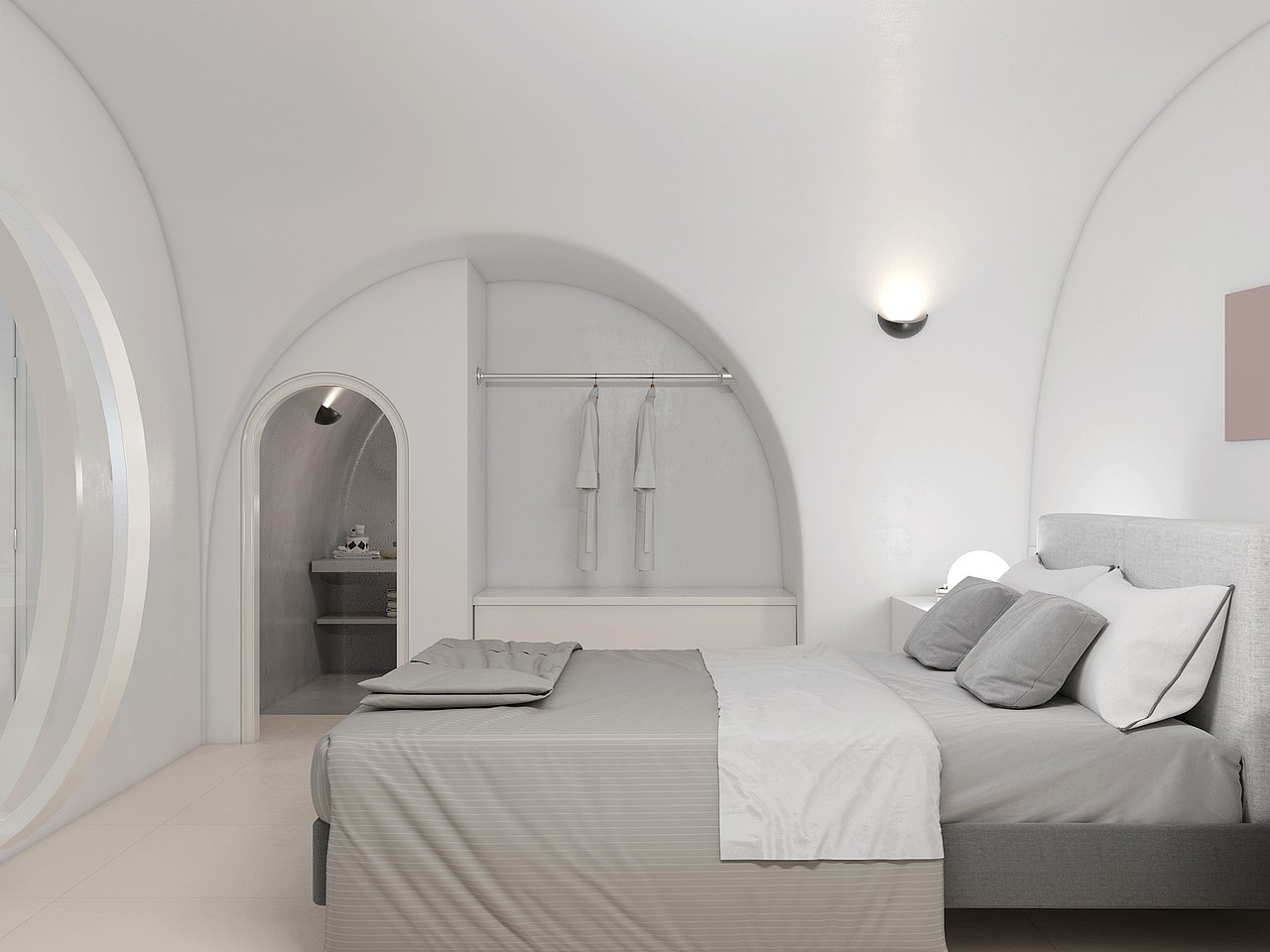 卧室洁白静谧,圆形的推门将卧室半露在前,若隐若现