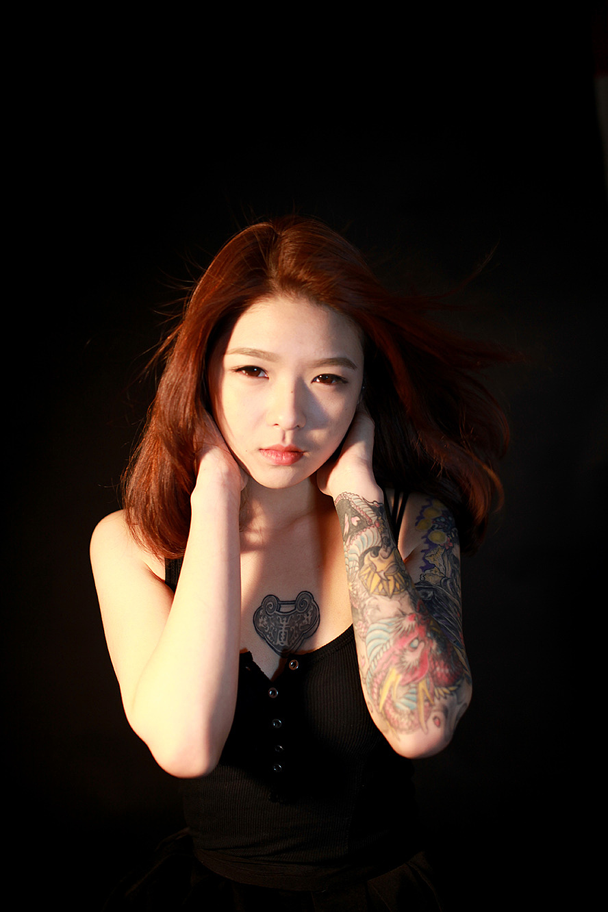 海德娜娜小花臂背后的温柔