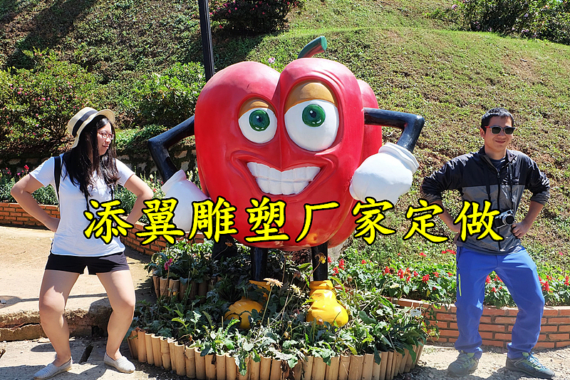 户外感受全域旅游之美巨大玻璃钢辣椒娃娃雕塑让你心醉