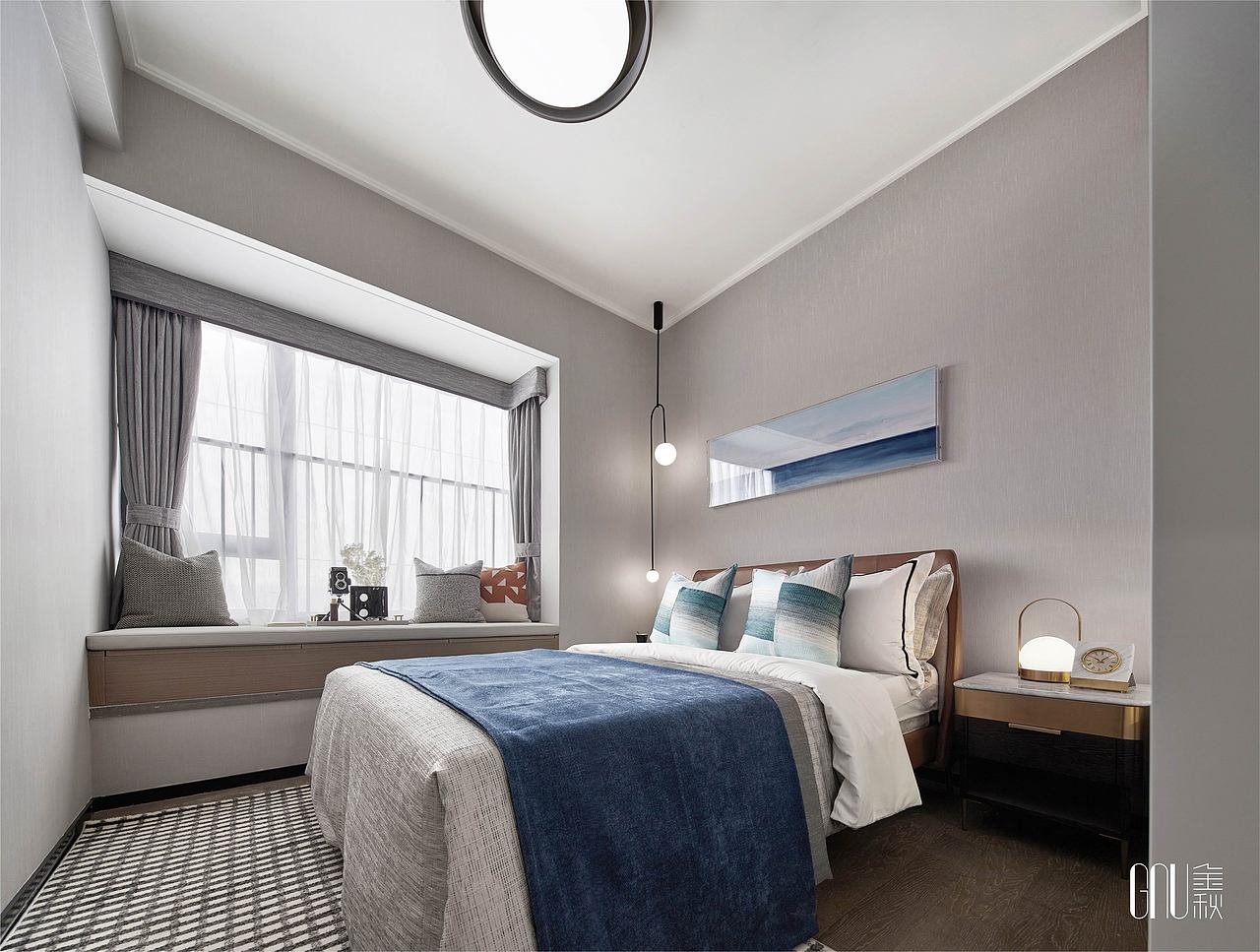 客卧是另一番雅致平和的景象,设计师提取了来自海洋的色调,让低调的美感充盈在每一个角落。