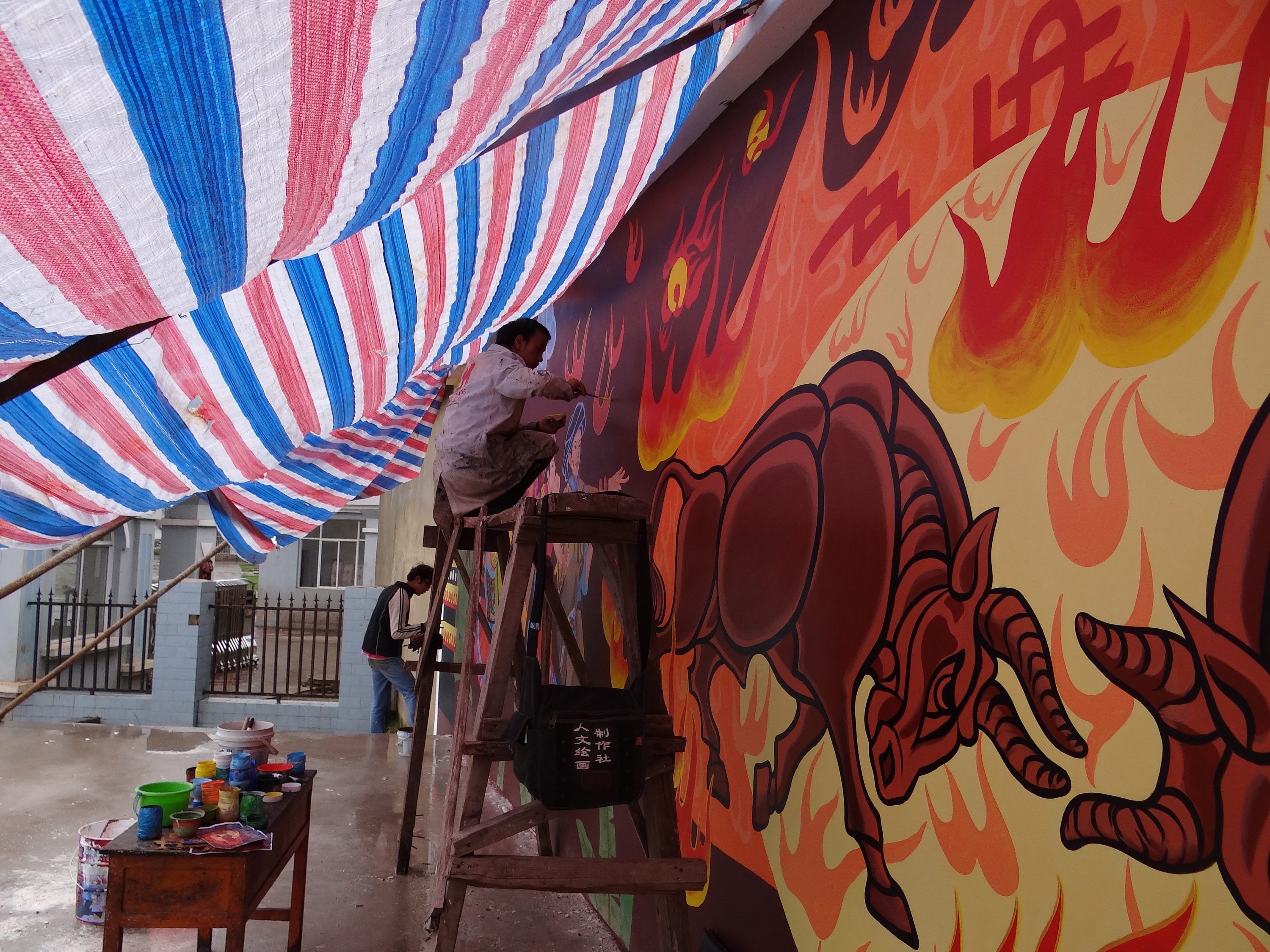 云南红河哈尼族壁画墙体彩绘