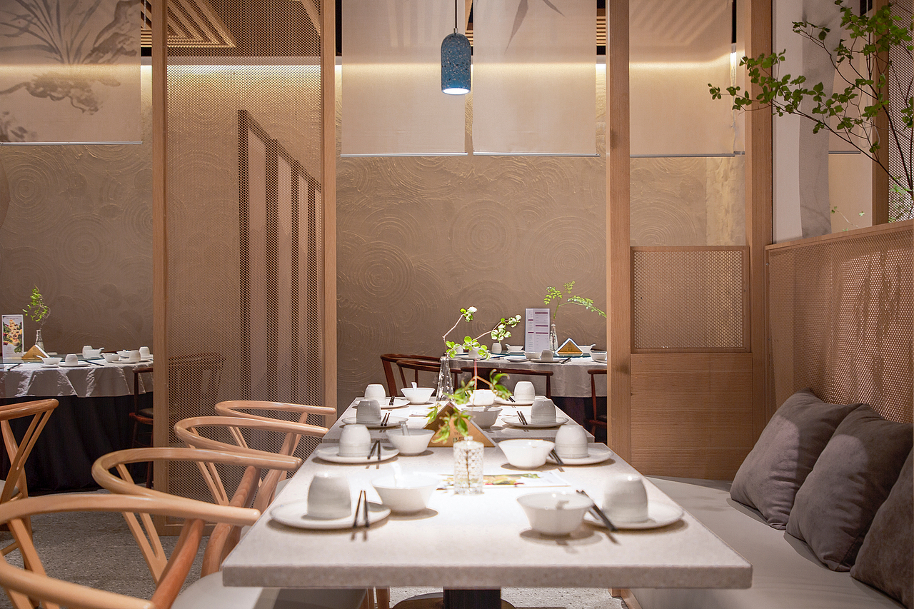 袁新智:圆融微喜的餐饮空间