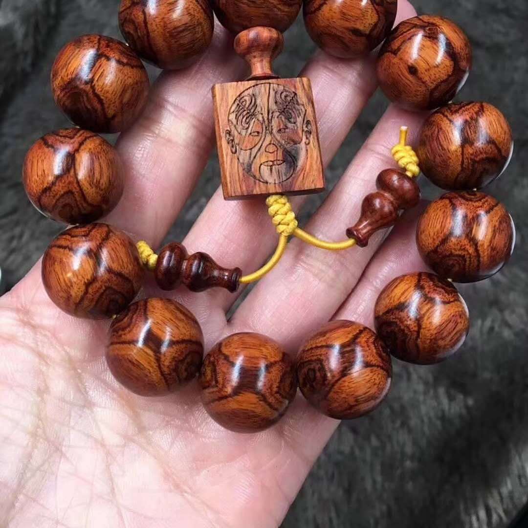 海南黄花梨老料满纹精致对眼——龙掌柜文玩