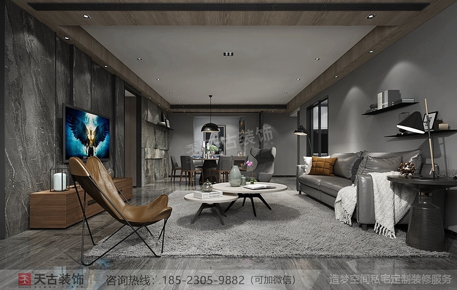 以高级灰为主色调的负一楼休闲厅，给人一种极致经典、成熟稳重而又不失一番惊艳和韵味，灰色的皮质沙发、金属感落地灯、石纹电视墙、通过材质堆叠出丰富的视觉层次。