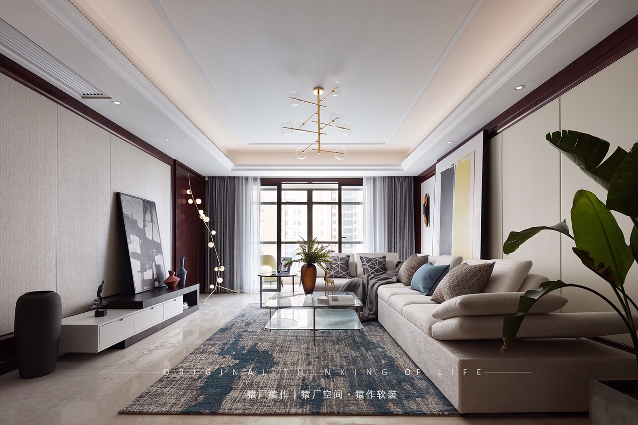 客厅以蓝灰色系和米色系为主,色彩饱和度较低的主色调柔和地融入红木基底中,高级灰的处理提升了空间的现代感与质感。