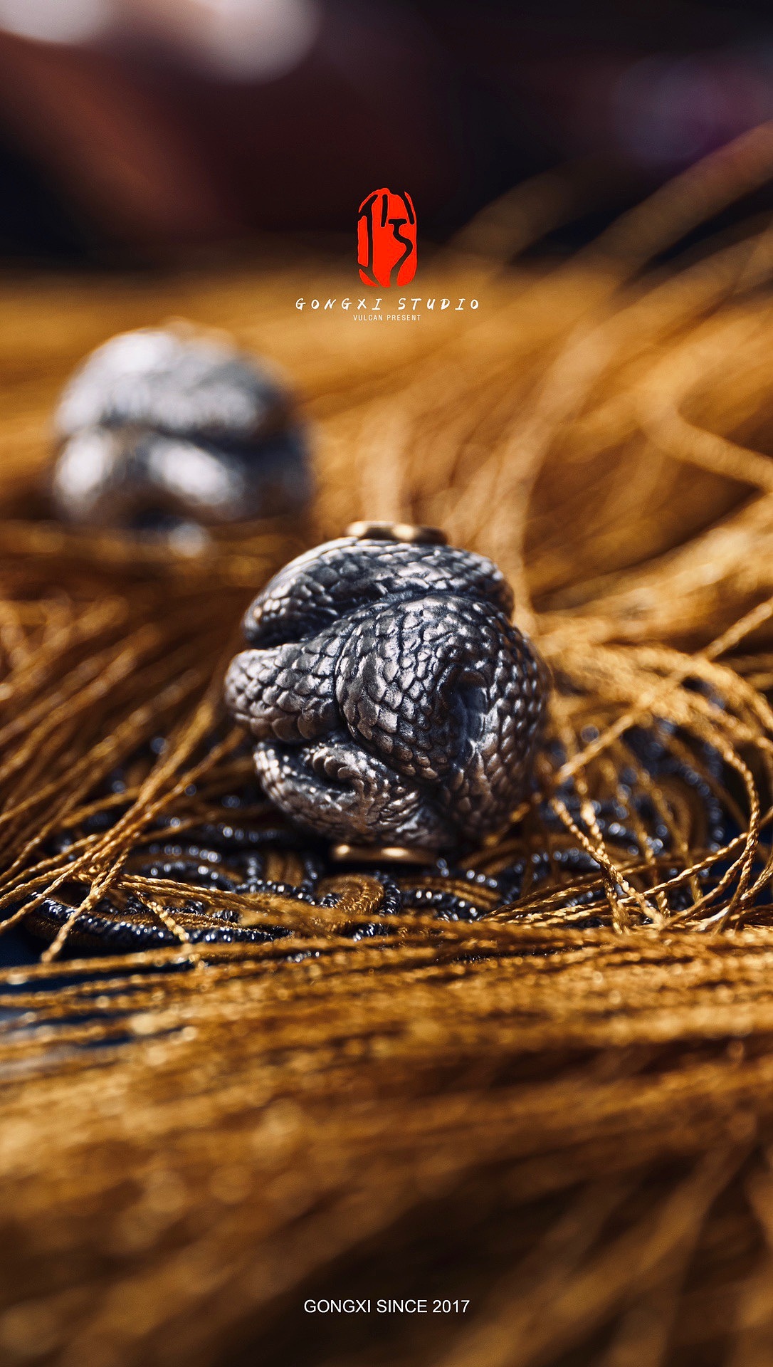 工兮·巳蛇球珠