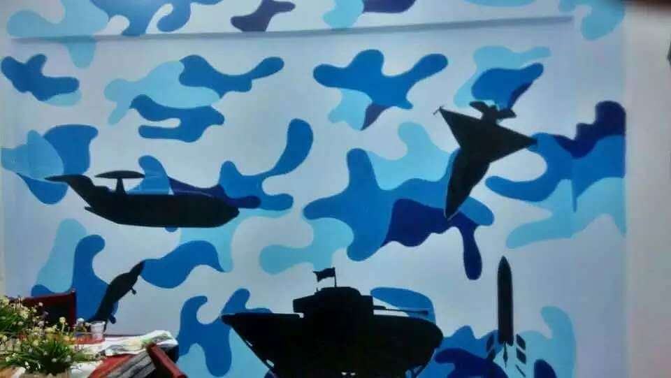 南京鱼餐馆墙体创意彩绘y手绘迷彩墙来了