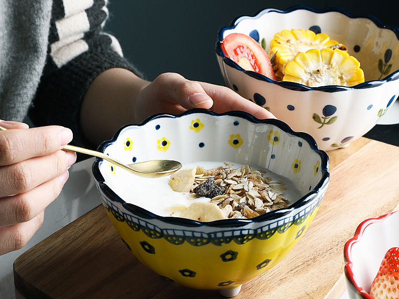高脚三足花边碗