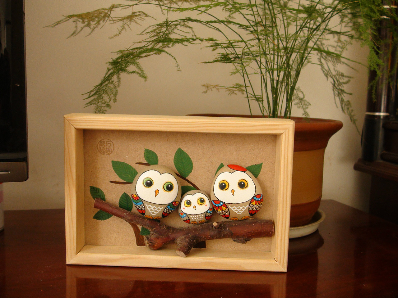 手绘鹅卵石猫头鹰石头画