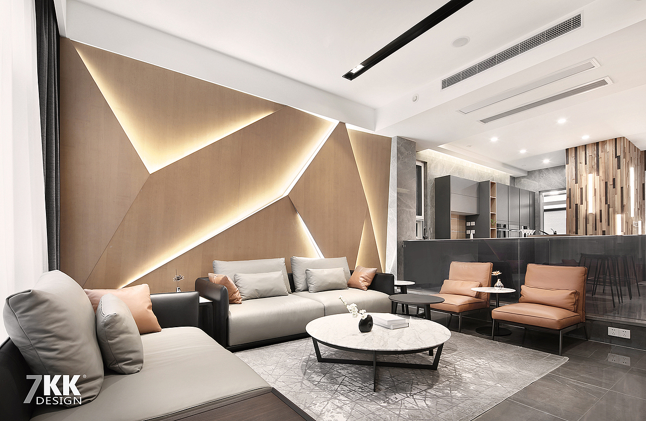 从客厅看餐厅厨房,空间功能上并没有完全隔开,而是采用半隔断深灰色玻璃作为功能划分,看似独立又有空间上的延伸感。