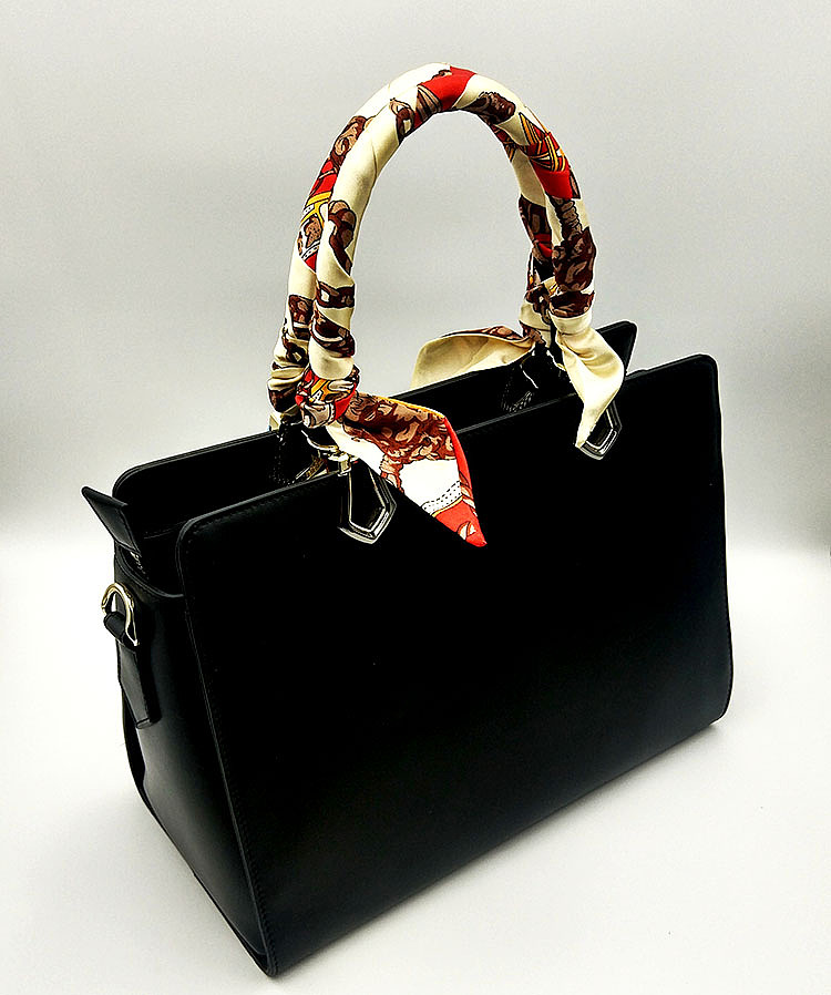 比翼双飞系列皮雕女包