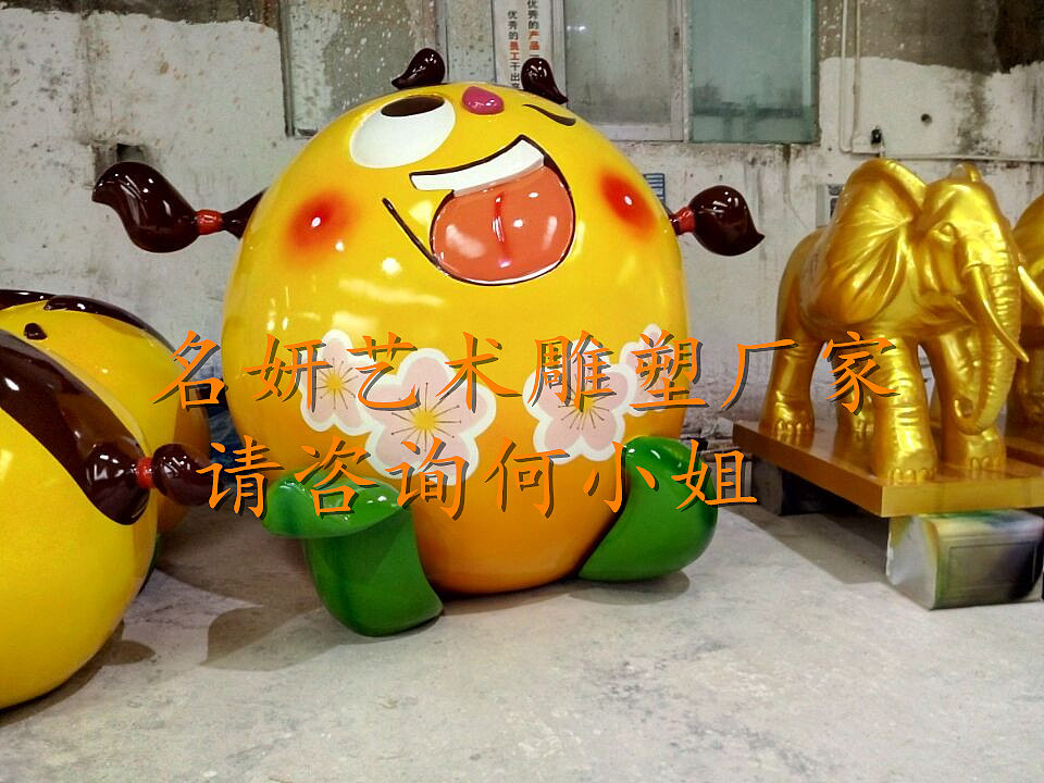 宜昌小镇打造水果王国景区大型玻璃钢蜜桔卡通公仔雕塑