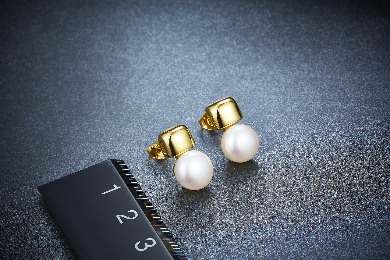 珠宝摄影~创意布光珠宝场景图蓝色背景场景图