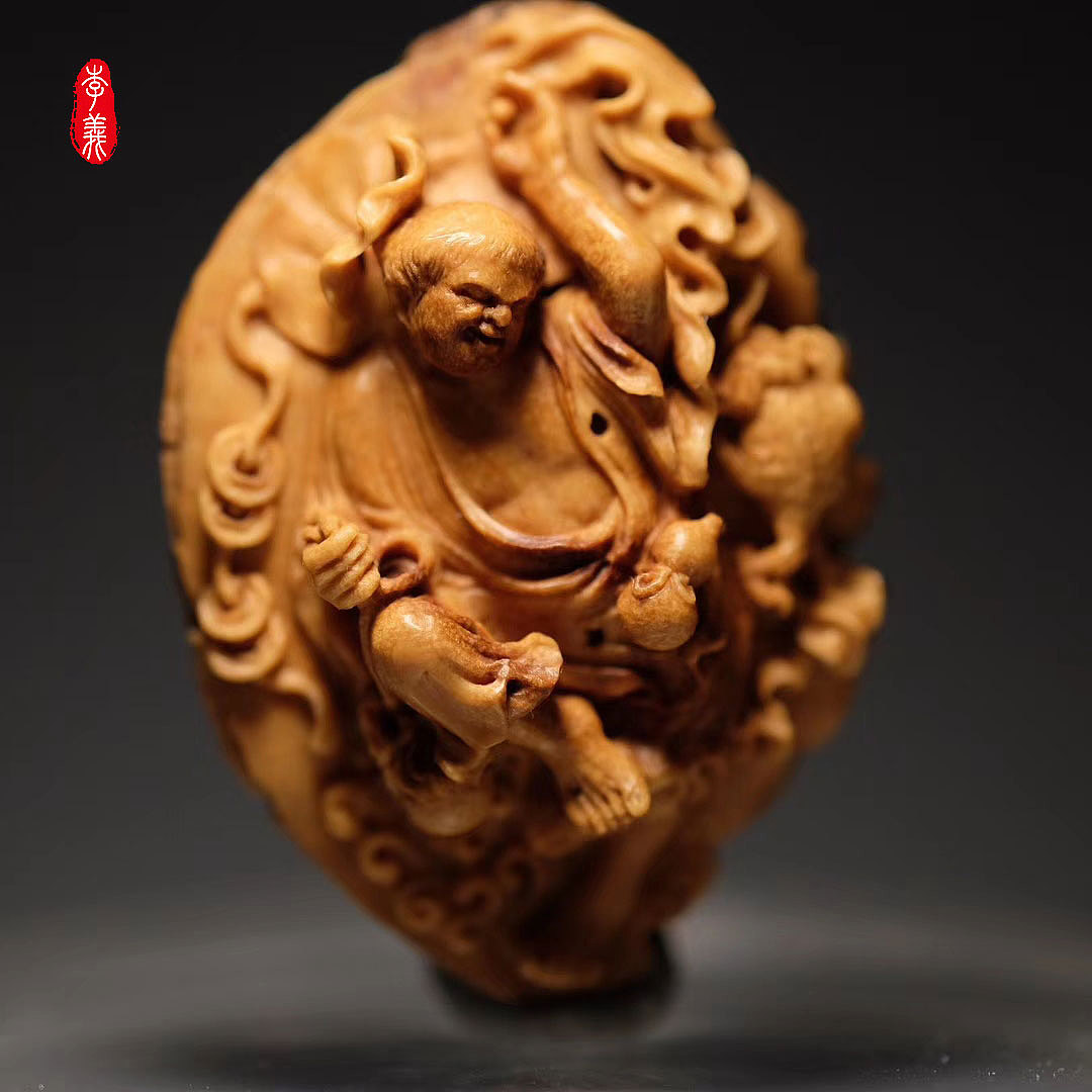 李义核雕——刘海戏金蟾