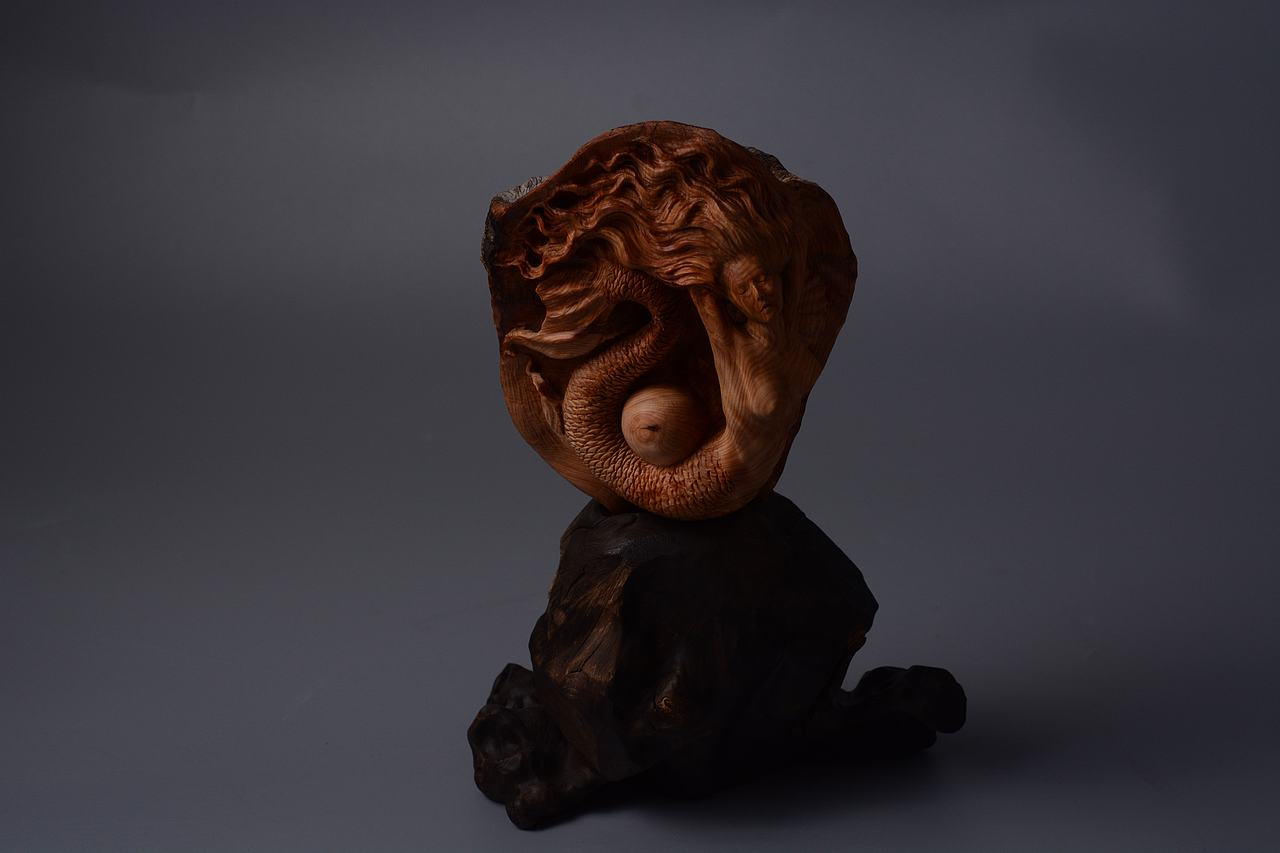 东匠集锦汇木雕崖柏变异瘤海的女儿摆件