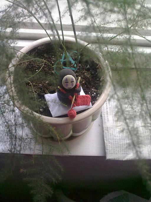 织毛衣的无脸男