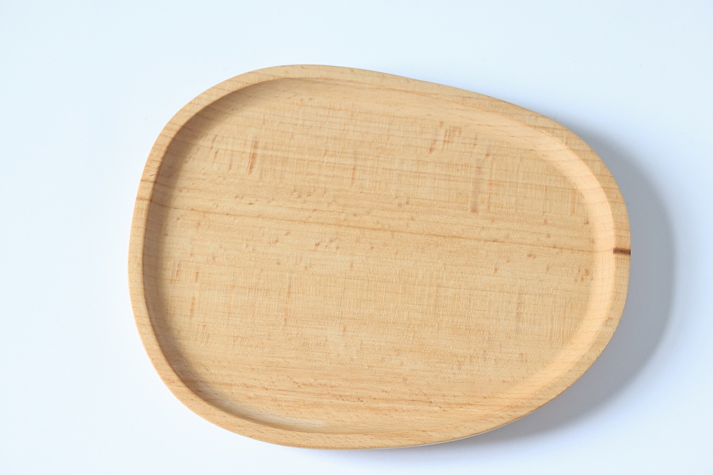 一组盘子摄影图片木盘水果盘