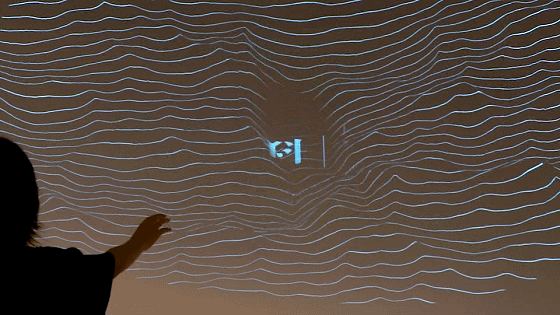 概念互动投影让The Lab品牌标识及slogan进行创意露出,吸引来访者进行趣味探索式的旅程。不锈钢等金属元素组合皮革、玻璃赋予空间通透雅致及神秘的未来科技感,流动的线条延展出品牌无限的想象力。