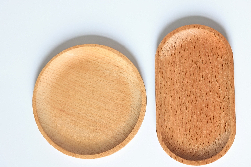 一组盘子摄影图片木盘水果盘