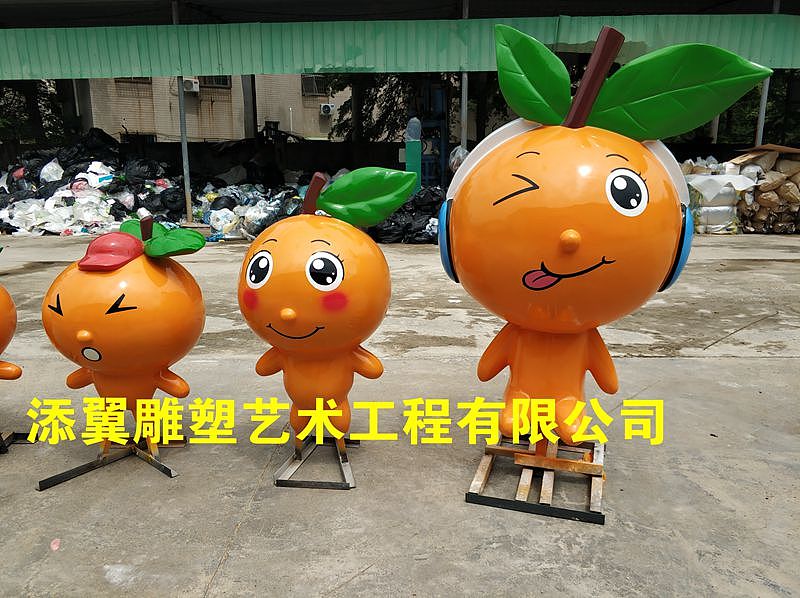 旅游景区奠定了坚实基础树脂纤维柑桔福娃造型雕像