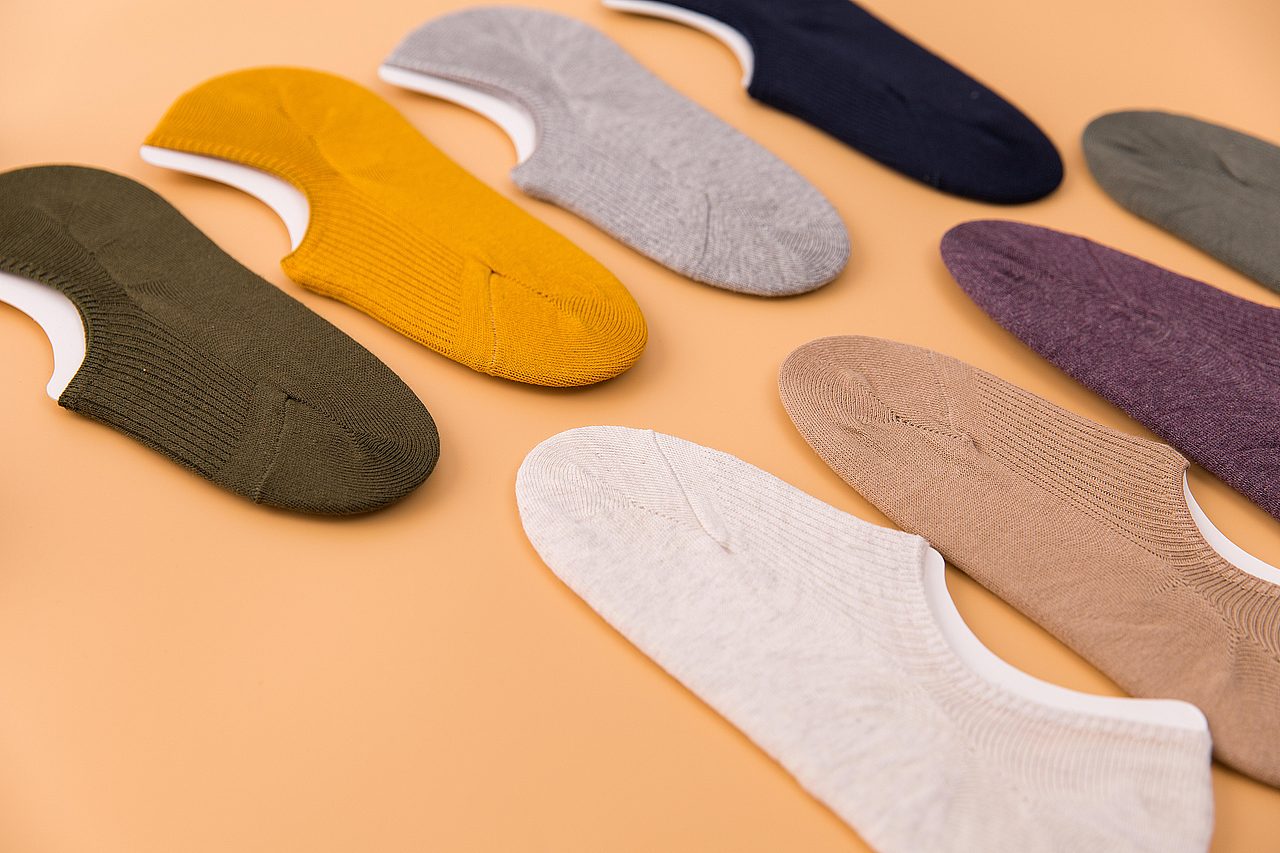 浅黄底袜子静物拍摄