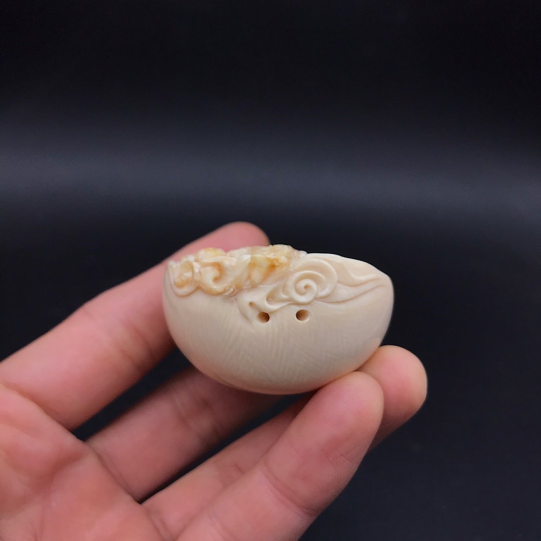 猛犸牙牙髓一念之间牌子金亮大师牌子