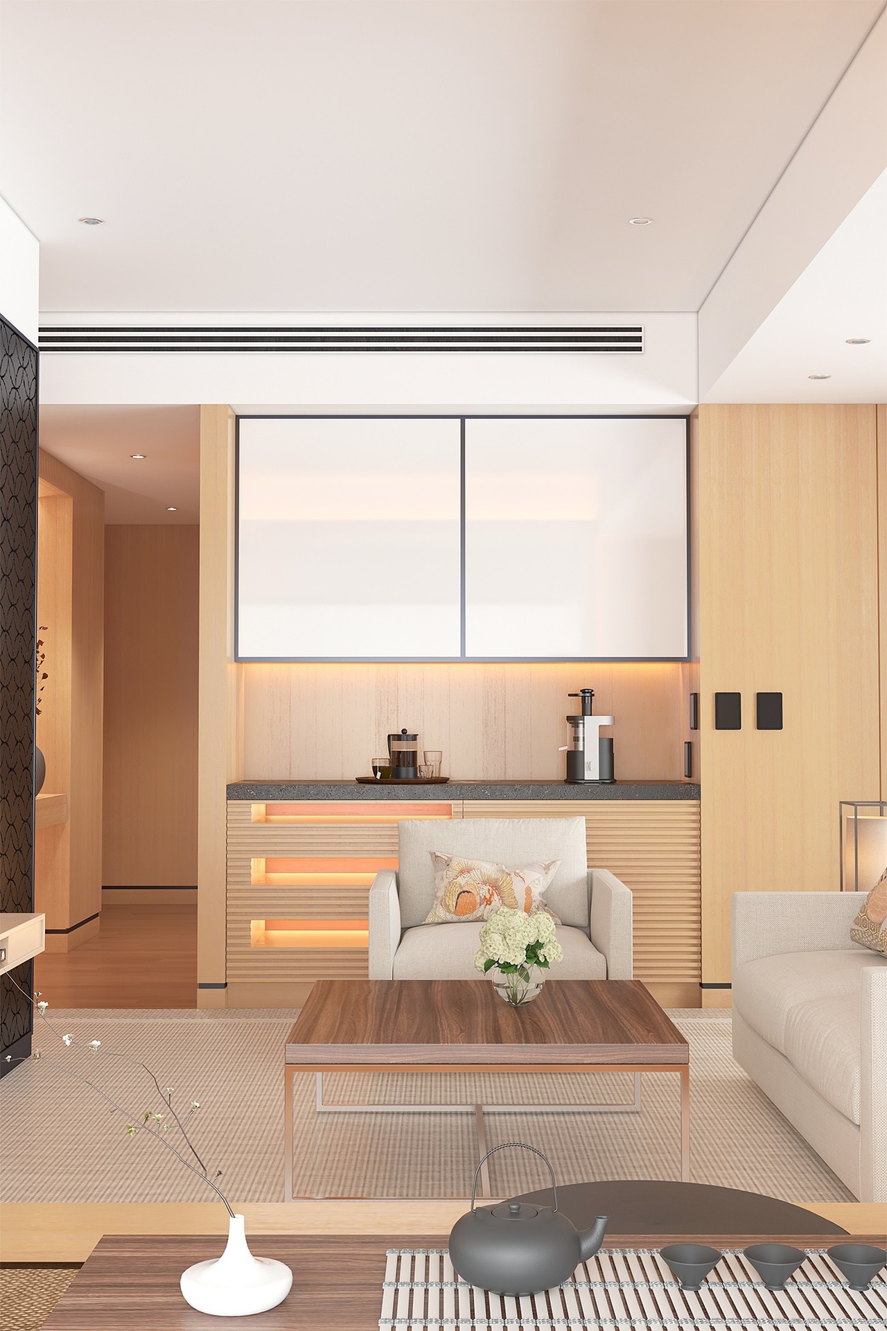 另一边的白色柜面与房顶墙面无缝串接，下方Mini Bar的设计则让每一处空间物尽其用。