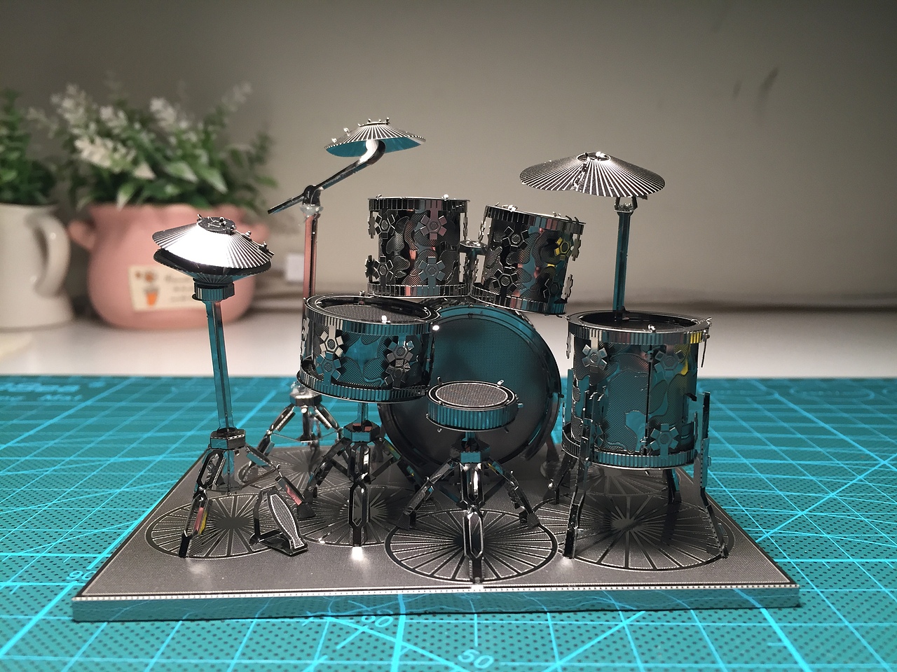 歪歪扭扭的,如果有这样的真鼓,估计真不受力。