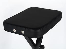 黑色皮质，带气孔，钢琴凳拍摄