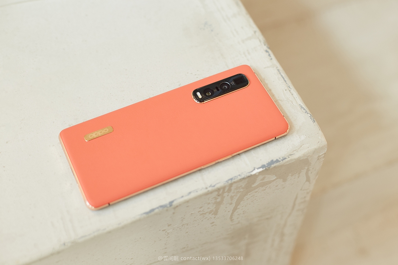 oppofindx2pro手机茶橘色场景图