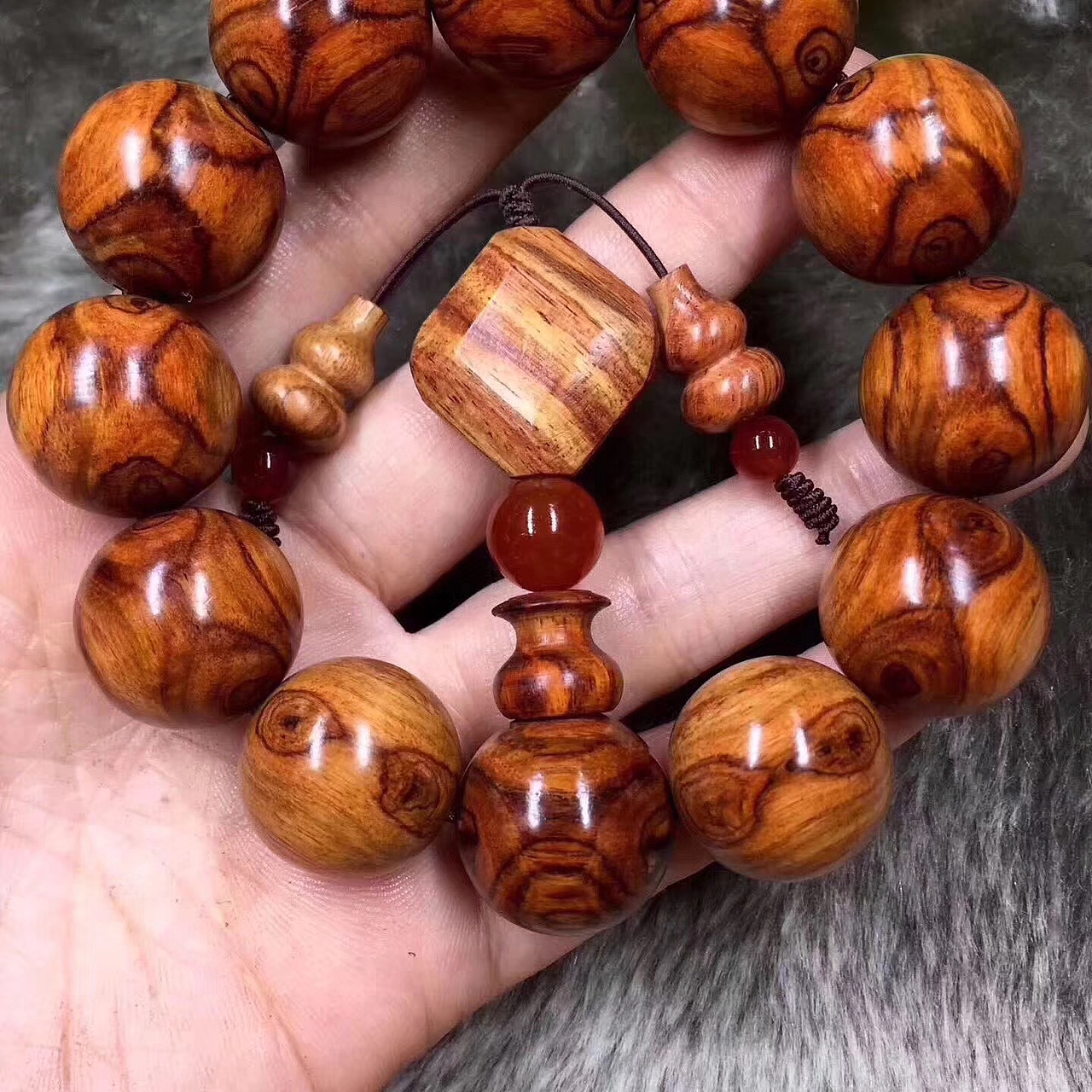 龙掌柜-海南黄花梨x纹对眼鬼脸|手工艺|工艺品设计|龙掌柜文玩_原创