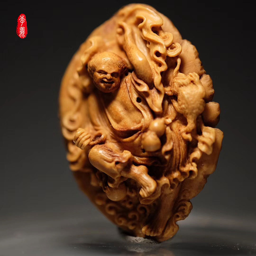 李义核雕——刘海戏金蟾