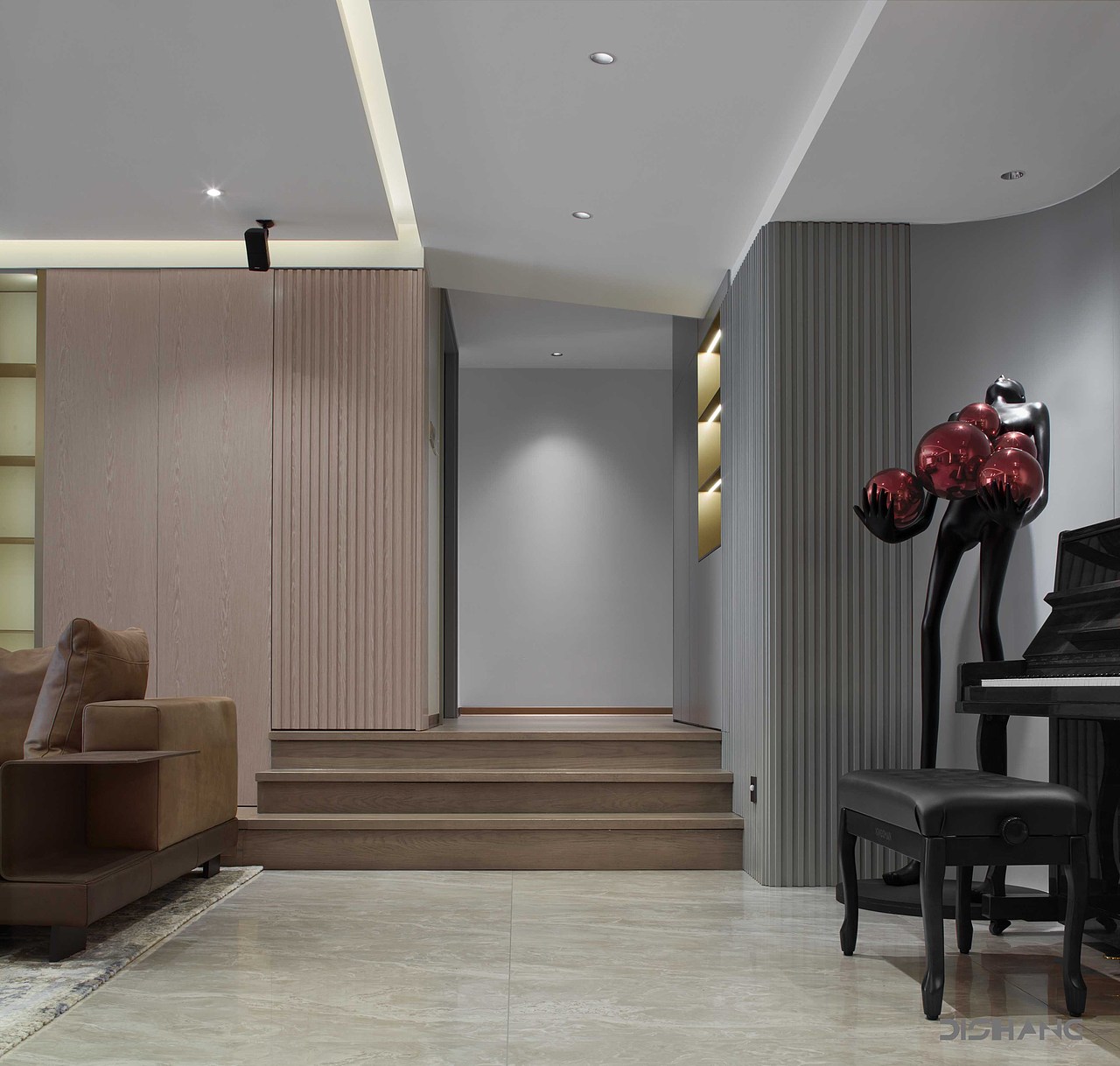 极致纯粹的细节,简约的线条构建,从直线的楼梯到斜面吊顶,它们有着异曲同工之妙,左侧设计了隐藏式收纳柜,通过艺术雕塑和写意的灰白画面,描绘和谐意境。
<br>