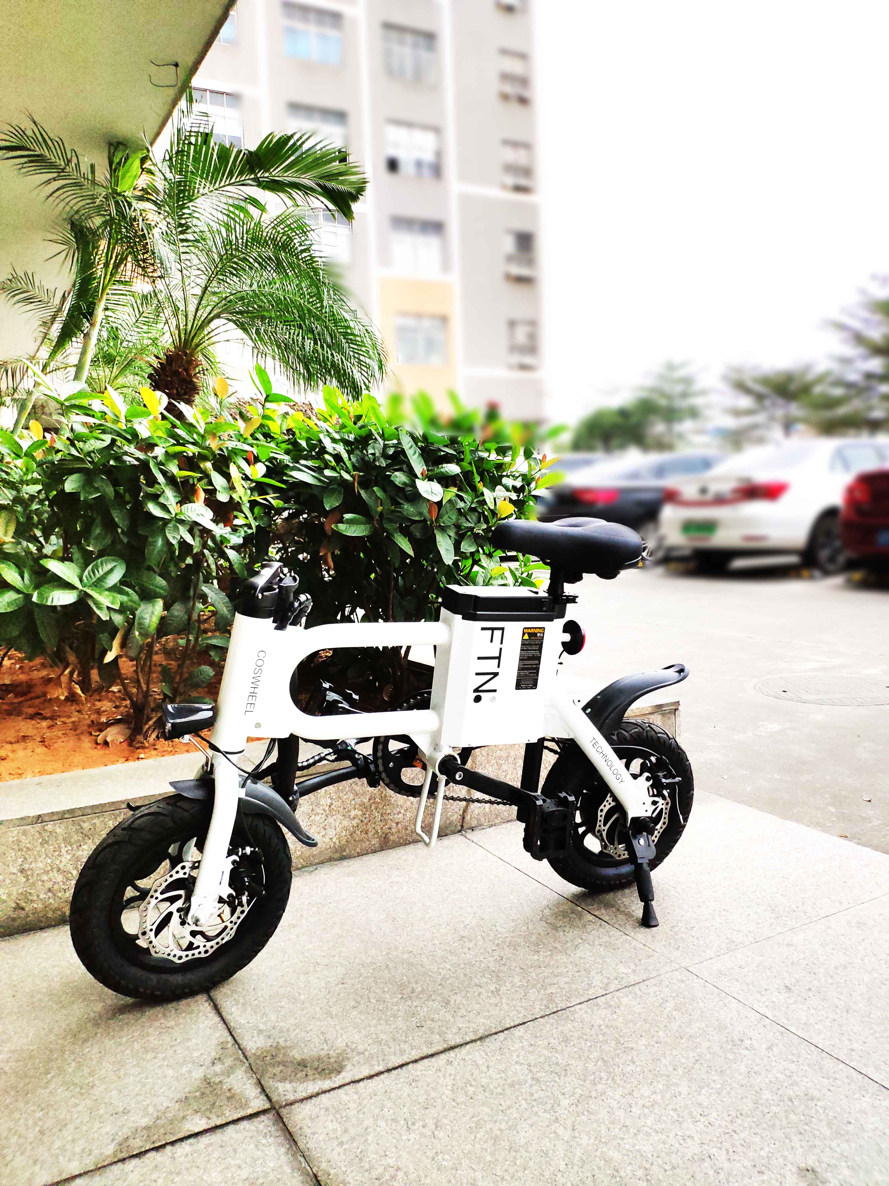 电动车看多了ftn这头梵牛电动车不仅仅很微电轻巧还可以接小孩