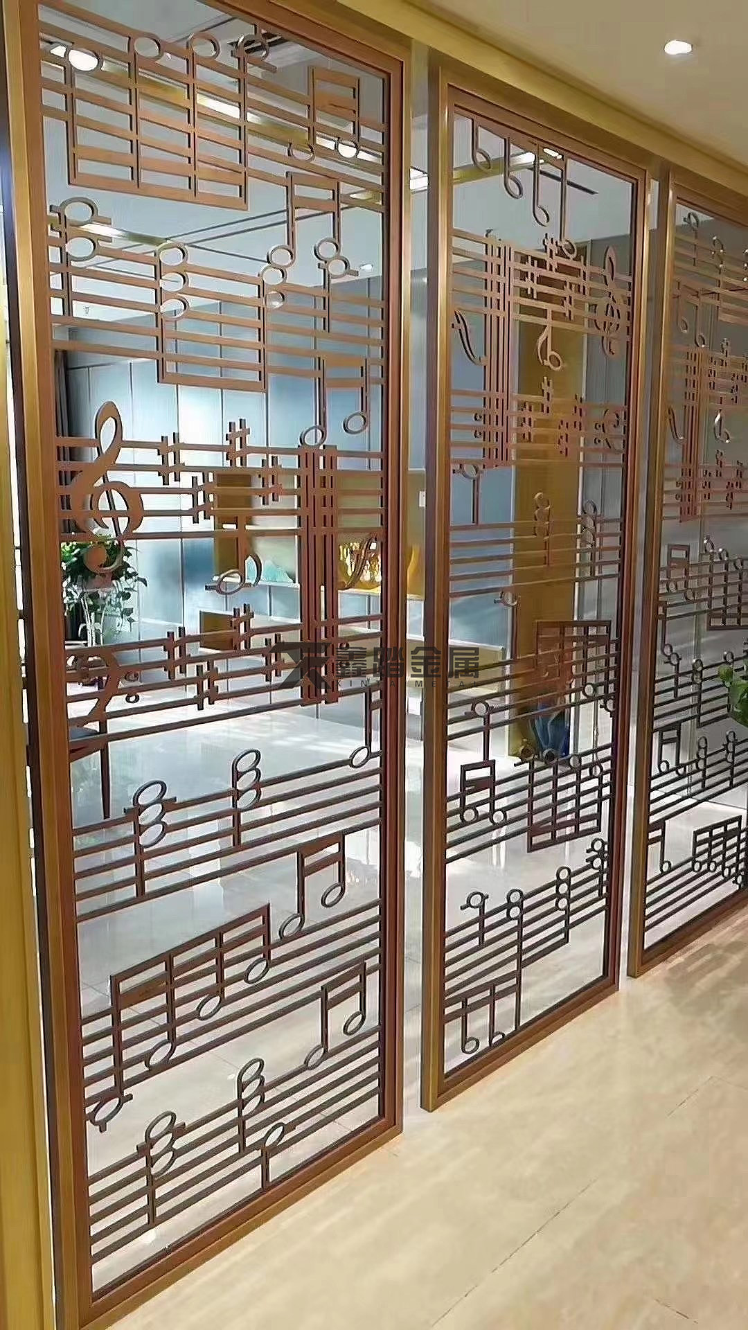 玫瑰金不锈钢屏风给酒店的装饰添加上浓墨重彩的一笔