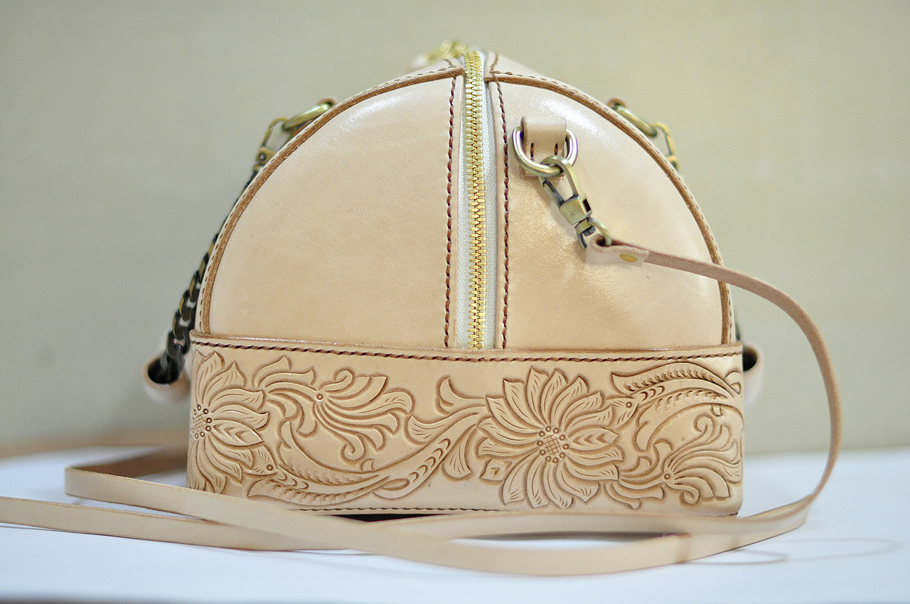 moli皮具 向日葵两用包