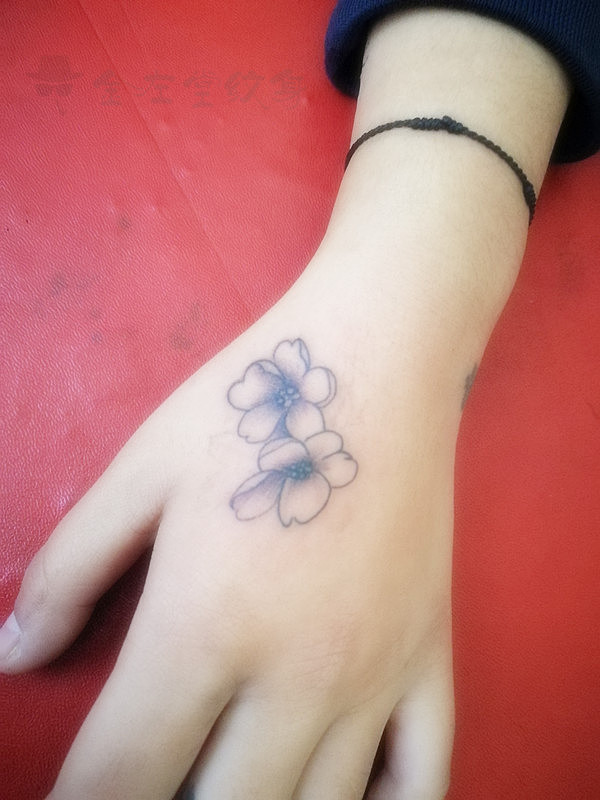 虎口纹身樱花纹身河南安阳金左堂纹身tattoo