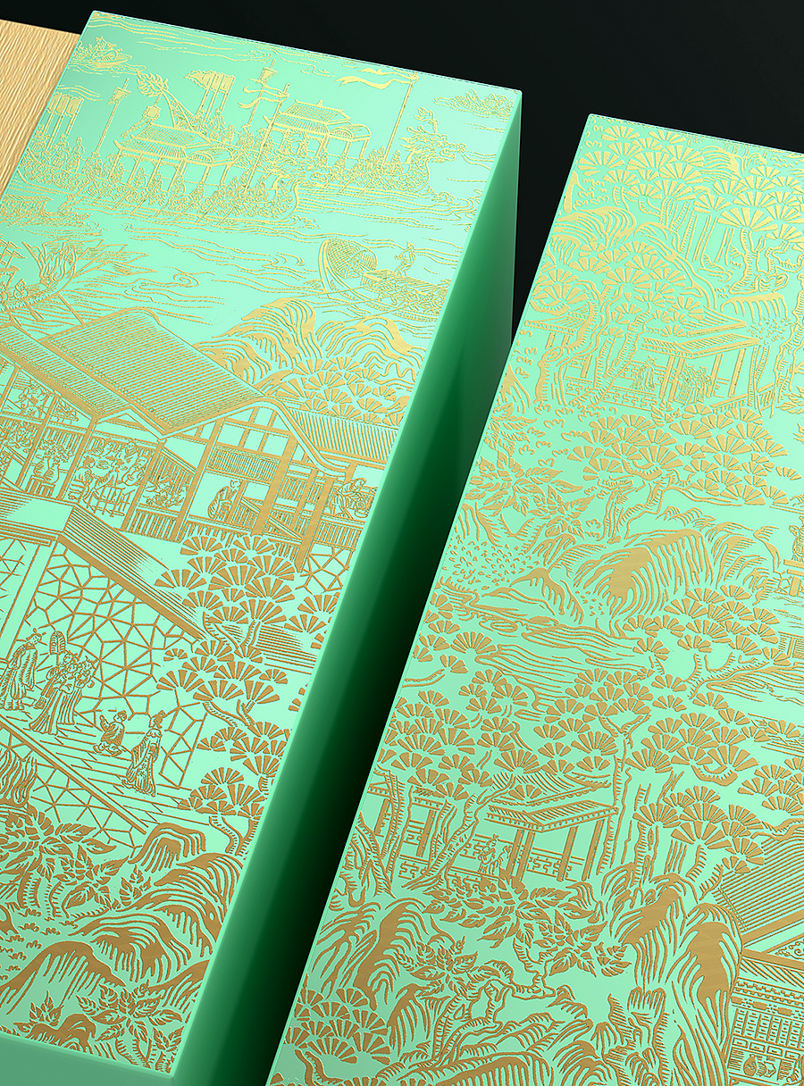 中间内侧的外盒则采用亚金色的竖条暗纹质感,而亮金色质感的圆形金牌