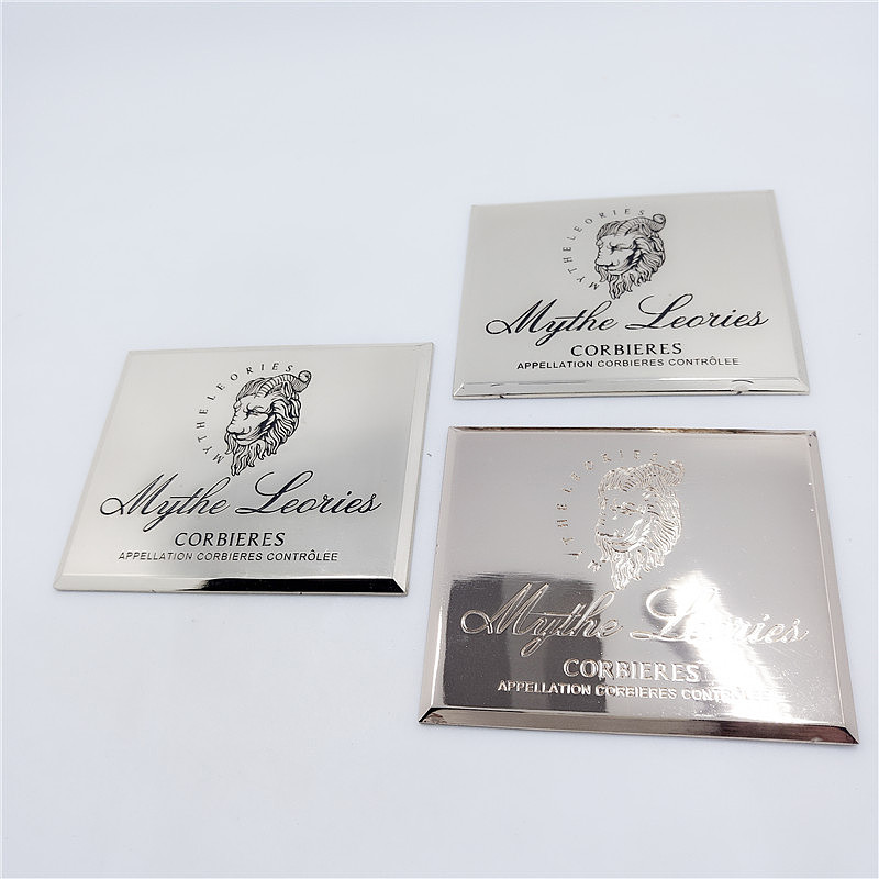 各种标牌五金垫片定制各种小标签金属牌镂空logo酒铭牌